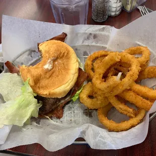 Bacon burger with side of onion rings