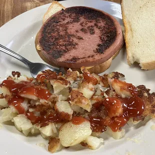Fried Bologna sandwich and hash browns.