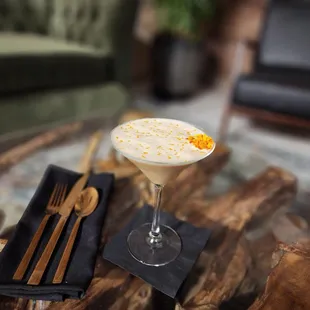 a cocktail in a martini glass