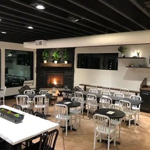 a restaurant with a fireplace