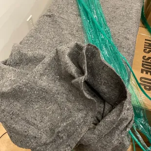 Paper-thin, musty blankets.