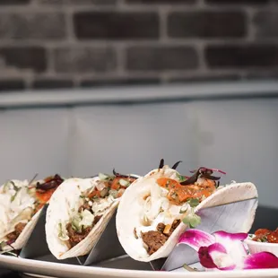 three tacos on a plate