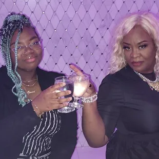 Mother and daughter toasting