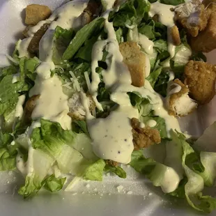 Takeout Caesar salad.