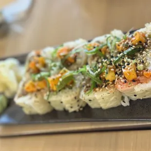 a plate of sushi on a table