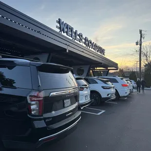 Front of Wells with not a parking spot available in the lot