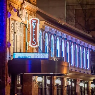 the front of the building at night