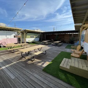 Outdoor pad at Welltown with the cool private retro campers to spend time with your crew.