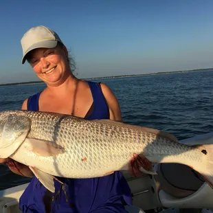 Ashley with her catch and release Red Drum citation.