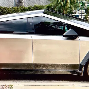 Tesla truck out front grabbing a to go order.