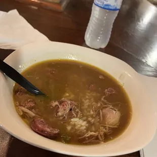 Sausage and chicken gumbo- lil spicy and good seasoning. Go for it.