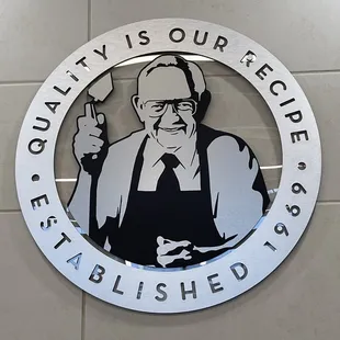 the quality is our people restaurant sign