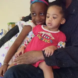 a man and two children