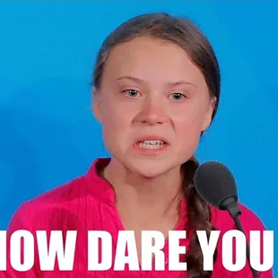 a girl speaking into a microphone