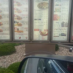 a side view mirror of a restaurant