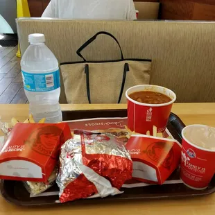 a tray of food and drinks