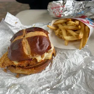 a hot cross bun and french fries