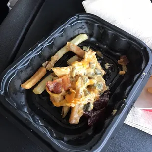 a meal in a styrofoam container