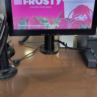 a tv screen with a strawberry frosty advertisement on it