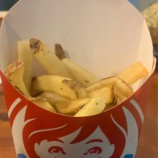 french fries in a paper container