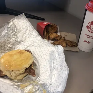 honey butter chicken biscuit and breakfast potatoes