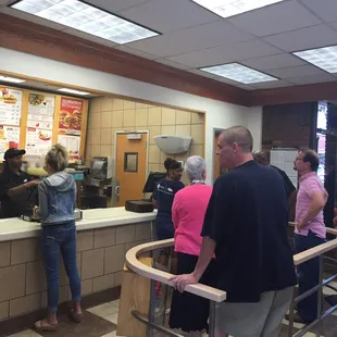 One lame ass cashier with 16 people in line!