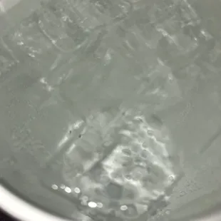 Sprite soda bottom of cup unknown substance. Seems to be dirt.
