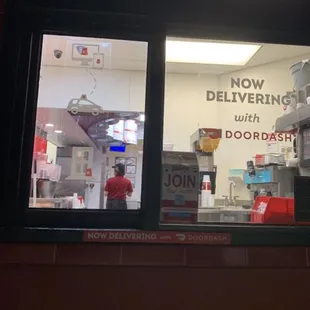 Time stamped picture of their drive thru hours and the girl ignoring me :-)