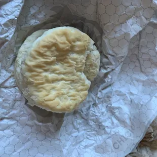 Pretty sure this is supposed to be a honey butter chicken biscuit. Lol this isn&apos;t even cooked. No honey butter nothing. This is a joke.