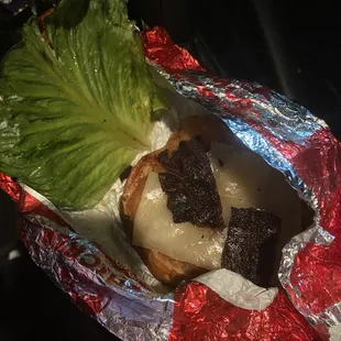 This the Sandwich with the burnt and black bacon I was giving to eat!