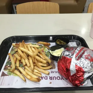 a tray of fries and a sandwich