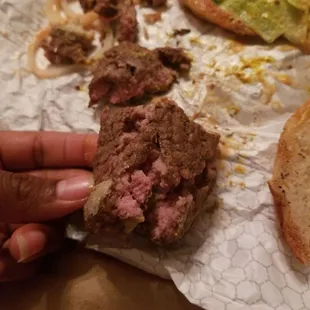 UNDERCOOKED raw hamburger patty