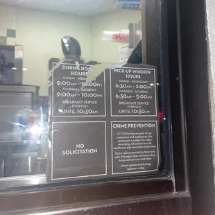 a menu in a restaurant window