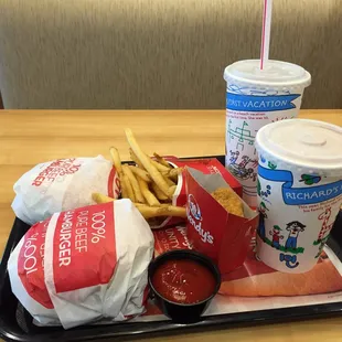 $4 for 4(bacon cheese burger, French fries, chicken nuggets and drink) and milkshake and a burger.