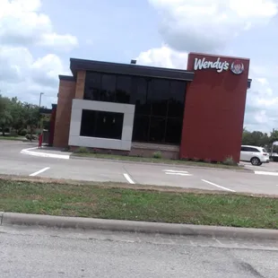 a view of the outside of a restaurant