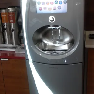 a water fountain in a kitchen