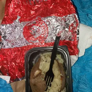 Plain baked potato and chicken sandwich wrapper