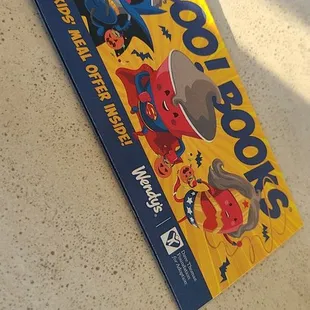 a box of cereal on the floor