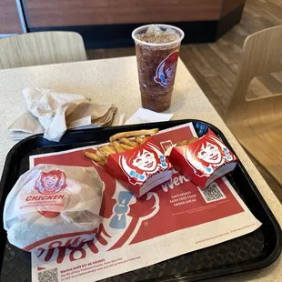 a tray of fries and a drink