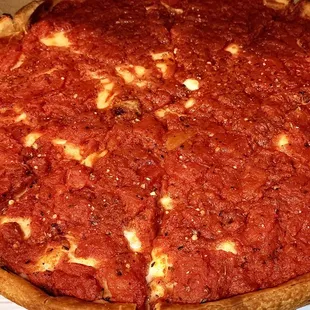 Absolutely delicious stuffed sausage Chicago Pizza.