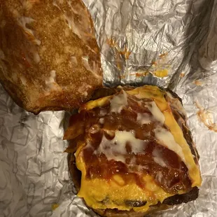 What's in this photo? Something I didn't order. It's supposed to be an Asiago chicken sandwich...