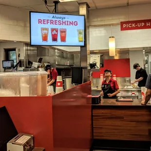 customers at the counter of a restaurant