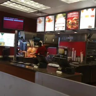 a view of a restaurant from the counter