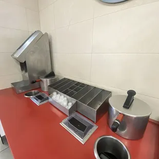 a kitchen counter with a red counter top