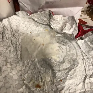 The food was good as usual, however the paper was still stuck to the cheese. Good thing I noticed before i took a bite.