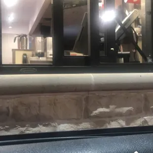 pulled into the drivethru at 11:40, took this pic at 11:47 after an employee came to the window refusing to serve me- their hours say 1 am