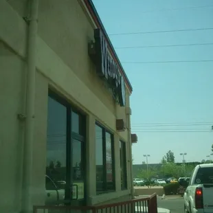 a view of the outside of a restaurant