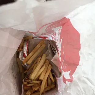 french fries in a paper bag