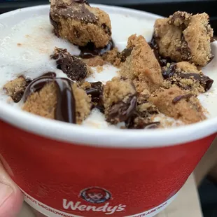 Vanilla ice cream, crumbles + choc. syrup