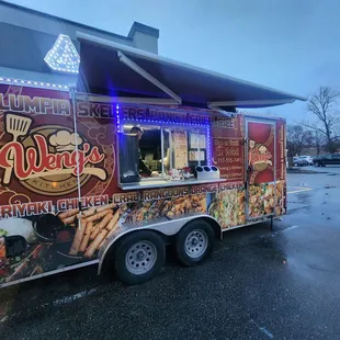 a food truck parked in a parking lot